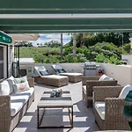 Sensational And Exotic 3-Bedroom Retreat In Nueva Andalucia With A Palm Garden