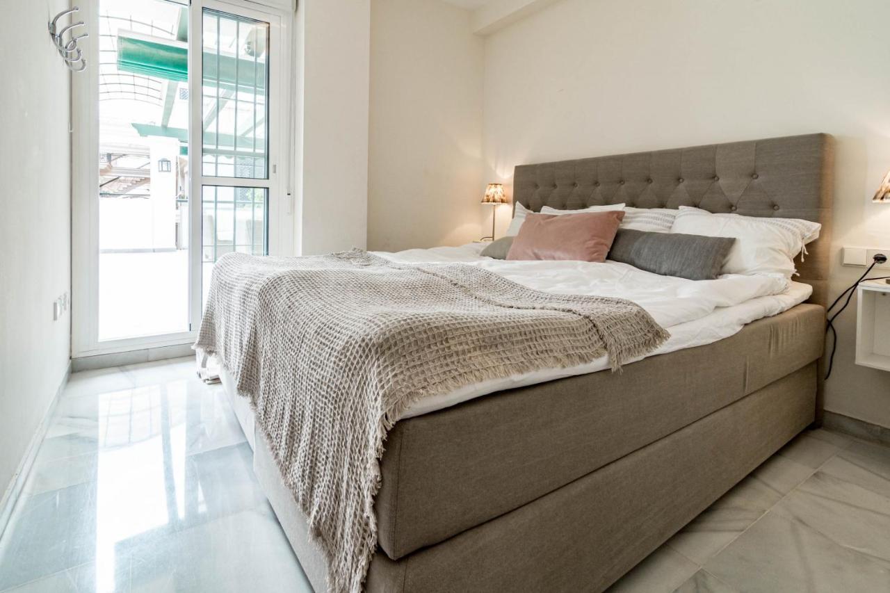 Sensational And Exotic 3-bedroom Retreat In Nueva Andalucia With A Palm Garden